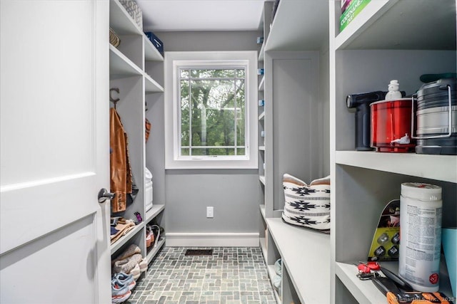 mudroom featuring baseboards