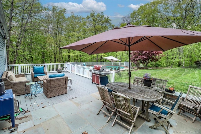 view of patio featuring an outdoor living space, a deck, an outdoor pool, and outdoor dining area