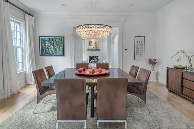 6 Spectacle Ln, Ridgefield, CT 06877 - dining space featuring wood finished floors, healthy amount of natural light, crown molding, and baseboards