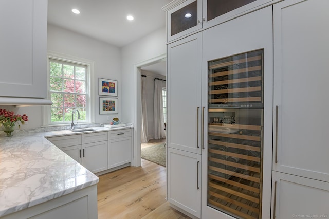 6 Spectacle Ln, Ridgefield, CT 06877 - bar area featuring a sink, recessed lighting, light wood finished floors, and wine cooler