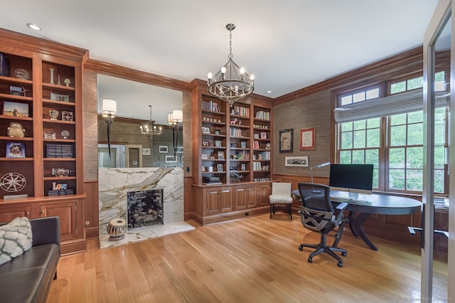 6 Spectacle Ln, Ridgefield, CT 06877 - home office with a chandelier, wood finished floors, a fireplace, crown molding, and built in features