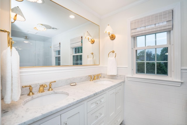 341 Quaker Ln N, West Hartford, CT 06119 - full bath with ornamental molding, double vanity, wainscoting, and a shower
