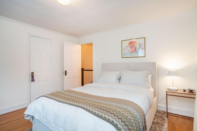 341 Quaker Ln N, West Hartford, CT 06119 - bedroom featuring wood finished floors, baseboards, and crown molding