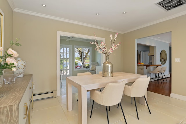 dining area featuring a baseboard heating unit, crown molding, light tile patterned floors, and recessed lighting