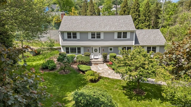 24 Lawrence Hill Rd, Stamford, CT 06903 - colonial home with a chimney and a front lawn