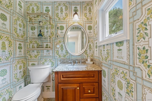 24 Lawrence Hill Rd, Stamford, CT 06903 - bathroom with wallpapered walls, toilet, and vanity
