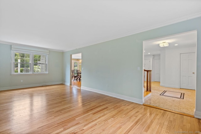 24 Lawrence Hill Rd, Stamford, CT 06903 - unfurnished room with light wood-type flooring, ornamental molding, and baseboards