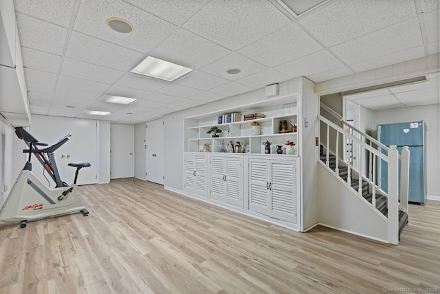 24 Lawrence Hill Rd, Stamford, CT 06903 - workout area featuring a drop ceiling, wood finished floors, and baseboards