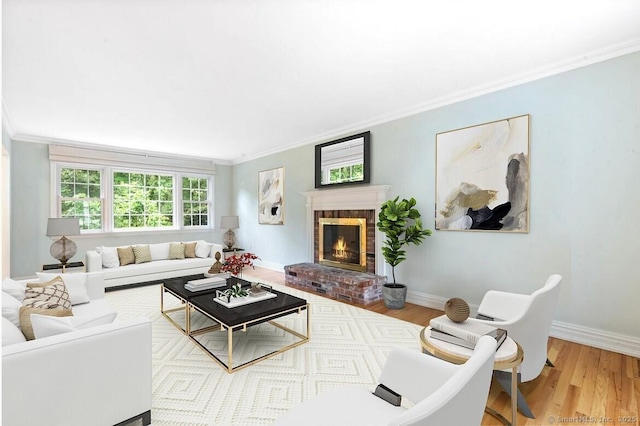 24 Lawrence Hill Rd, Stamford, CT 06903 - living room featuring crown molding, a brick fireplace, wood finished floors, and baseboards