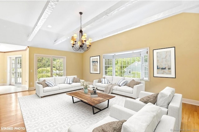 24 Lawrence Hill Rd, Stamford, CT 06903 - living area with beamed ceiling, a chandelier, baseboards, and light wood finished floors