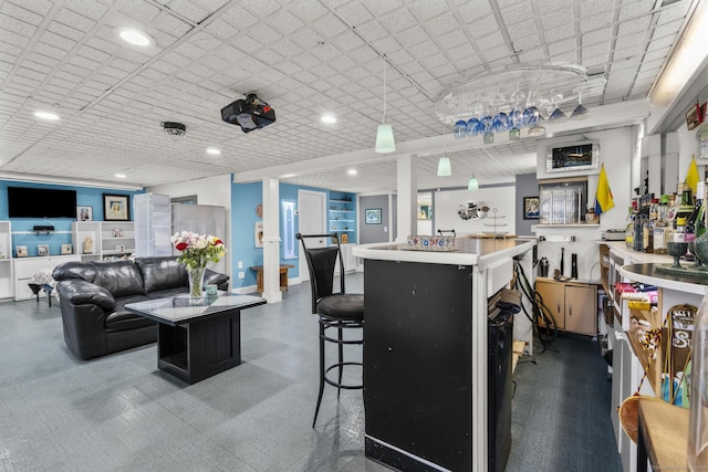 kitchen with a breakfast bar area and a kitchen island