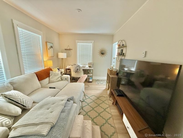 661 E Main St, Stratford, CT 06614 - living room featuring light wood finished floors and baseboards