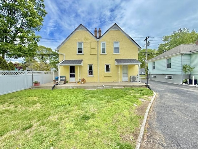 661 E Main St, Stratford, CT 06614 - back of house with a patio area and stucco siding
