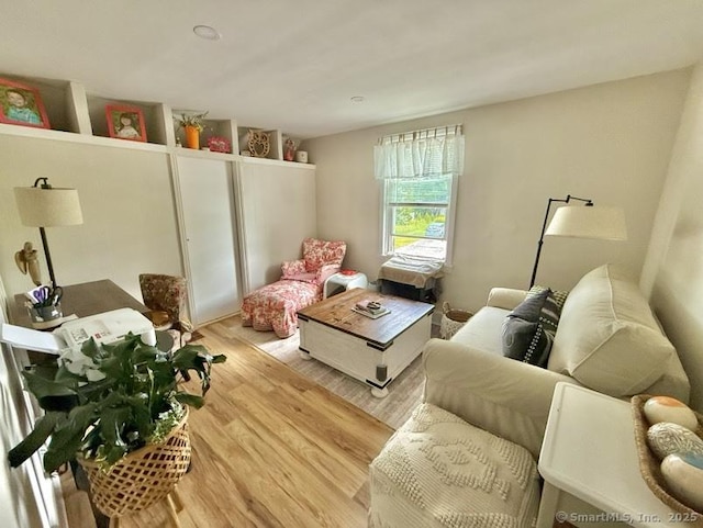 661 E Main St, Stratford, CT 06614 - living area with light wood-type flooring