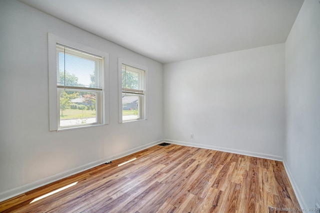 661 E Main St, Stratford, CT 06614 - empty room featuring light wood-style flooring and baseboards