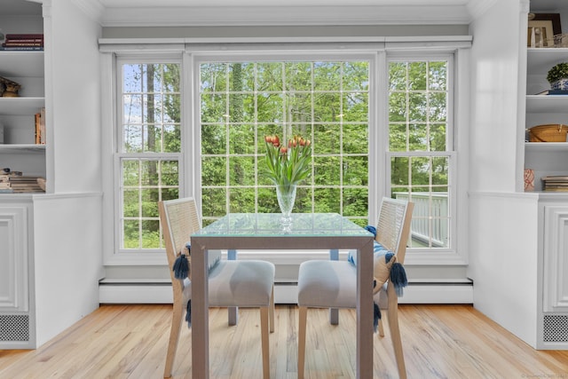 94 Glen Dr, New Canaan, CT 06840 - dining room with wood finished floors, a baseboard radiator, and crown molding