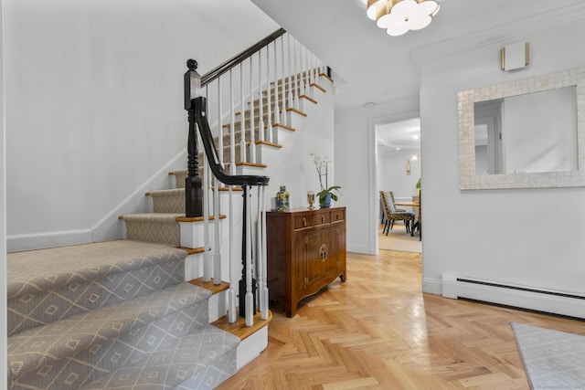 94 Glen Dr, New Canaan, CT 06840 - stairs featuring a baseboard heating unit, baseboards, and a chandelier