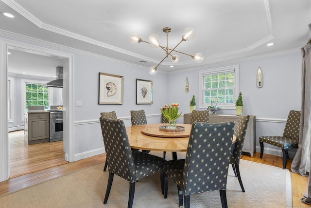 94 Glen Dr, New Canaan, CT 06840 - dining room featuring plenty of natural light, a chandelier, light wood-style flooring, ornamental molding, and recessed lighting