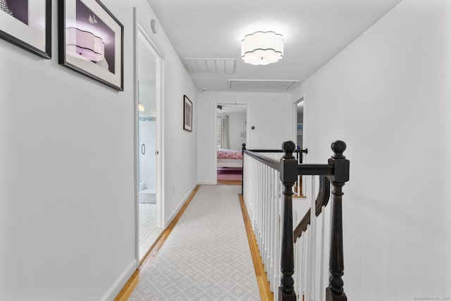 94 Glen Dr, New Canaan, CT 06840 - hall with attic access, an upstairs landing, and baseboards