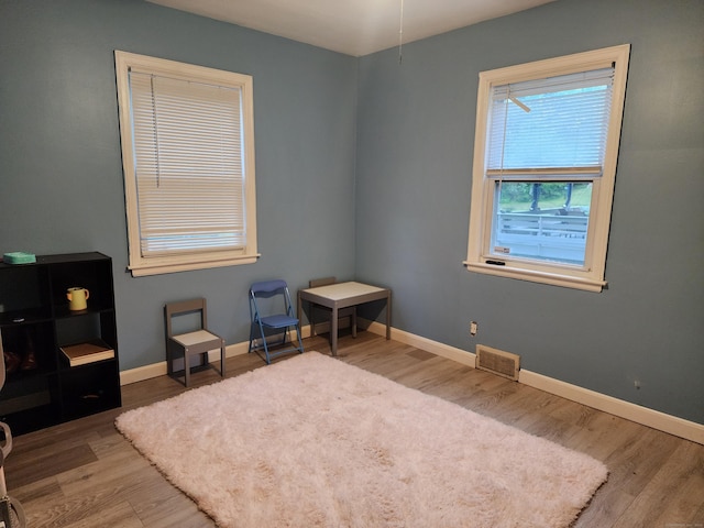 348 Harwinton Ave, Torrington, CT 06790 - sitting room with wood finished floors and baseboards