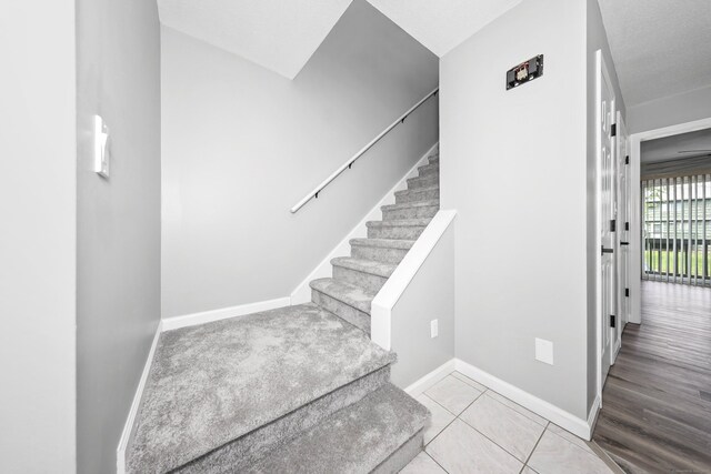 1400 Meriden Rd Apt 1-2, Waterbury, CT 06705 - stairs featuring baseboards