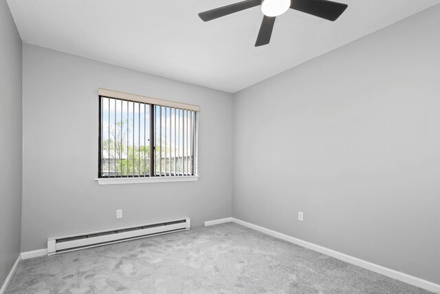 1400 Meriden Rd Apt 1-2, Waterbury, CT 06705 - unfurnished room featuring a baseboard heating unit, carpet flooring, ceiling fan, and baseboards