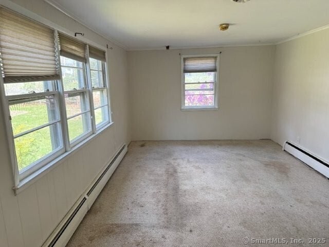 6 Spencer Pl, New Haven, CT 06515 - carpeted spare room with a baseboard radiator, plenty of natural light, and crown molding