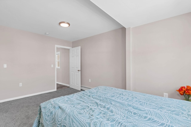 bedroom featuring carpet, baseboards, and a baseboard radiator