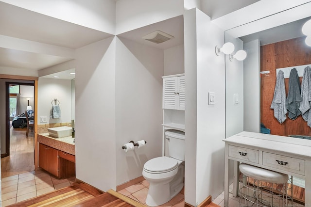 6 Knorr Rd, Oxford, CT 06478 - bathroom with toilet, ensuite bath, vanity, baseboards, and tile patterned flooring