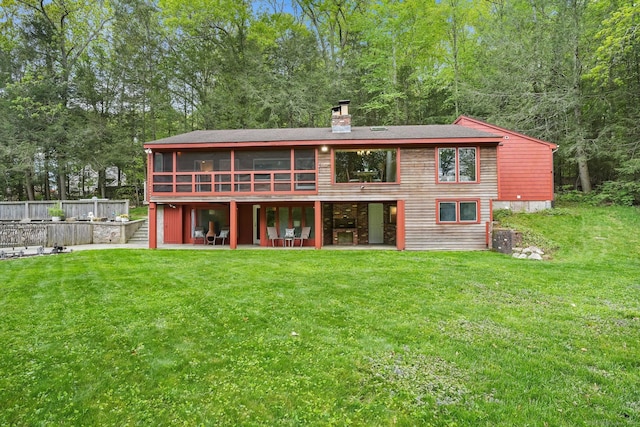 6 Knorr Rd, Oxford, CT 06478 - back of house with a chimney, a yard, a patio area, a sunroom, and a deck