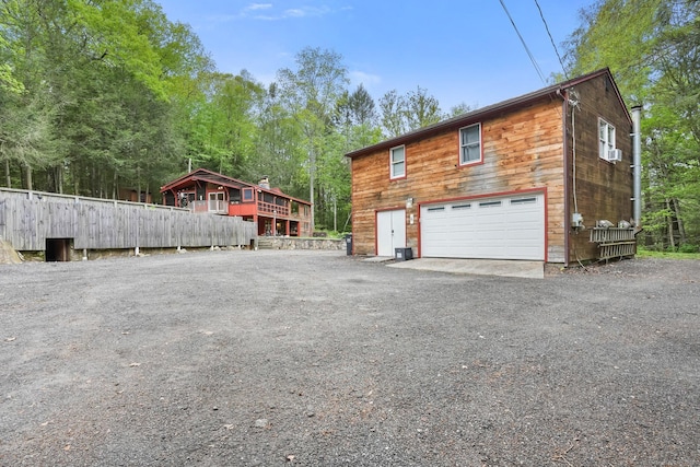 6 Knorr Rd, Oxford, CT 06478 - view of side of home with asphalt driveway
