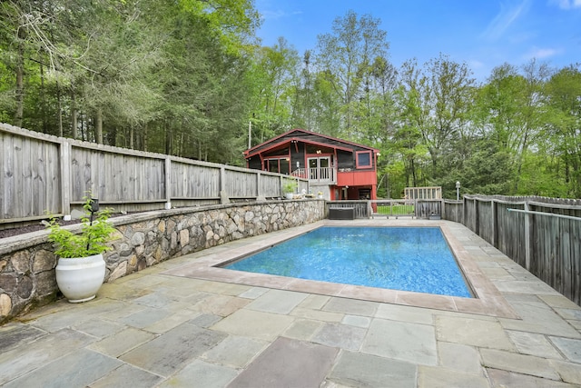 6 Knorr Rd, Oxford, CT 06478 - view of pool with a patio area, a fenced backyard, and view of wooded area