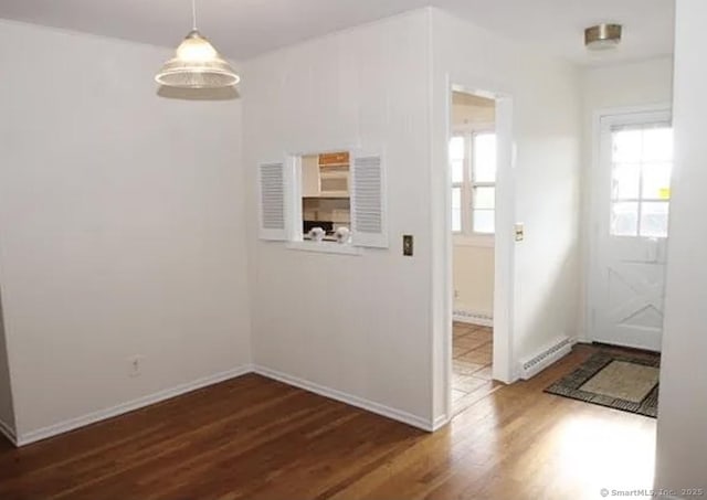245 Unquowa Rd Apt 127, Fairfield, CT 06824 - entrance foyer featuring wood finished floors, baseboard heating, and baseboards