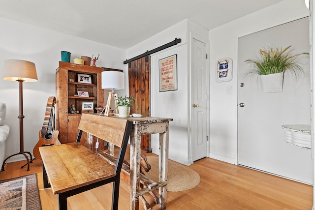 18 Hamre Ln Unit B, Branford, CT 06405 - dining space featuring wood finished floors and a barn door