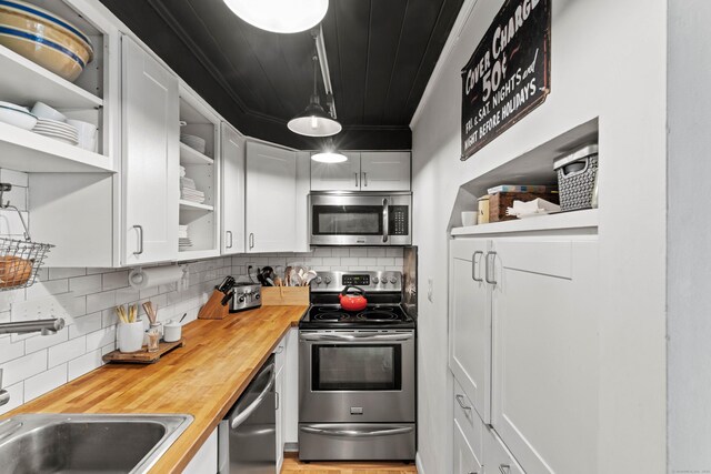 18 Hamre Ln Unit B, Branford, CT 06405 - kitchen with stainless steel appliances, open shelves, wood counters, tasteful backsplash, and wood ceiling