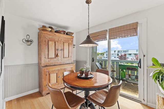 18 Hamre Ln Unit B, Branford, CT 06405 - dining space featuring a wainscoted wall and light wood-style flooring