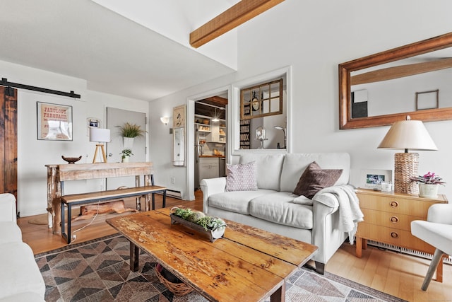 18 Hamre Ln Unit B, Branford, CT 06405 - living room featuring dark wood finished floors, baseboard heating, and a barn door