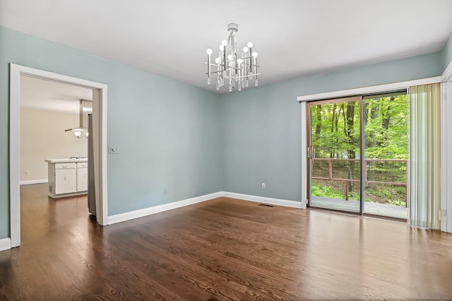 61 Stony Brook Rd, Middlebury, CT 06762 - empty room with a chandelier, baseboards, and dark wood finished floors