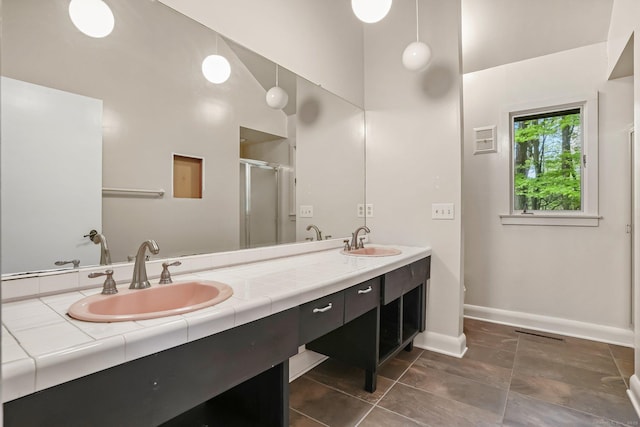 61 Stony Brook Rd, Middlebury, CT 06762 - full bath with a stall shower, double vanity, baseboards, and tile patterned floors