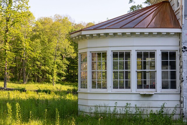 134 Roxbury Rd, Washington, CT 06793 - view of side of property featuring metal roof