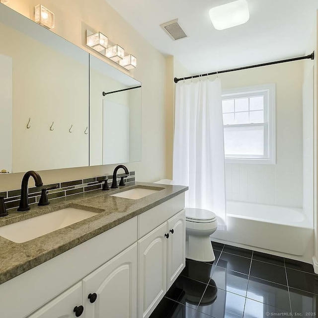 full bathroom with toilet, tile patterned flooring, double vanity, and shower / bath combination with curtain