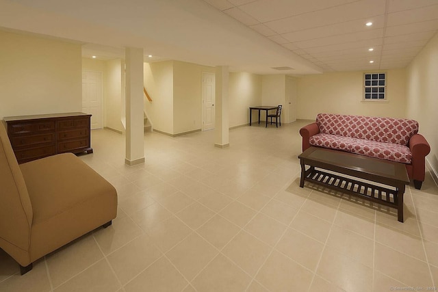 living area featuring recessed lighting, stairs, and baseboards