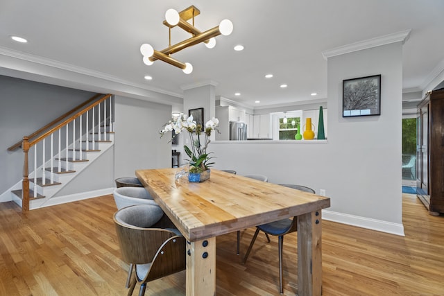 3 Arrowhead Rd, Madison, CT 06443 - dining space with ornamental molding, recessed lighting, light wood-style floors, baseboards, and stairs
