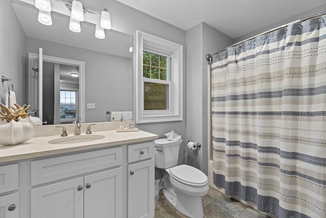3 Arrowhead Rd, Madison, CT 06443 - full bathroom with vanity, toilet, and a shower with shower curtain