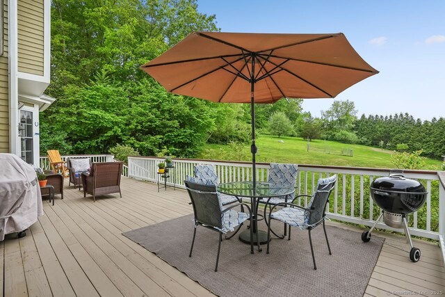 18 Beaver Dam Rd, Newtown, CT 06470 - deck featuring outdoor dining space and a yard