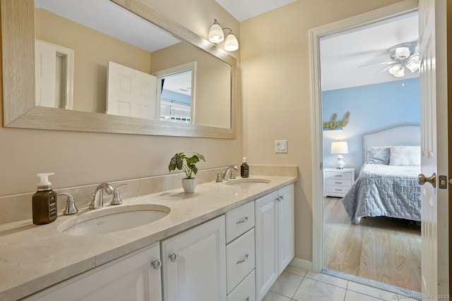 18 Beaver Dam Rd, Newtown, CT 06470 - full bath with ensuite bath, ceiling fan, double vanity, and tile patterned flooring