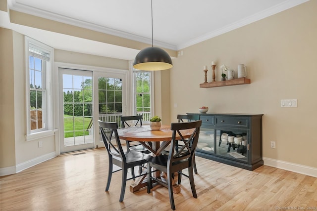 18 Beaver Dam Rd, Newtown, CT 06470 - dining room with ornamental molding, baseboards, light wood-style flooring, and plenty of natural light