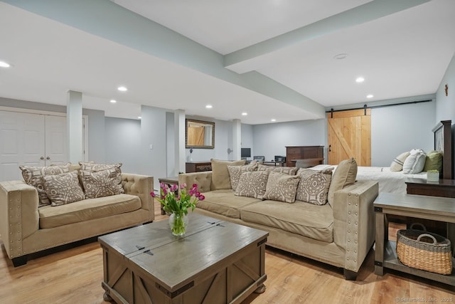 18 Beaver Dam Rd, Newtown, CT 06470 - living area featuring a barn door, light wood-style floors, beam ceiling, and recessed lighting