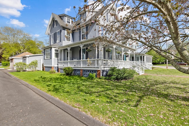 178 Shore Ave, Groton, CT 06340 - view of front facade with covered porch, a front lawn, and an outdoor structure