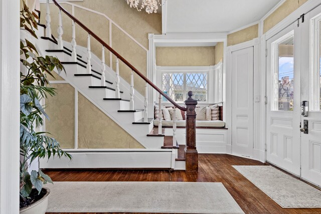 178 Shore Ave, Groton, CT 06340 - entrance foyer with hardwood / wood-style flooring, stairway, and ornamental molding